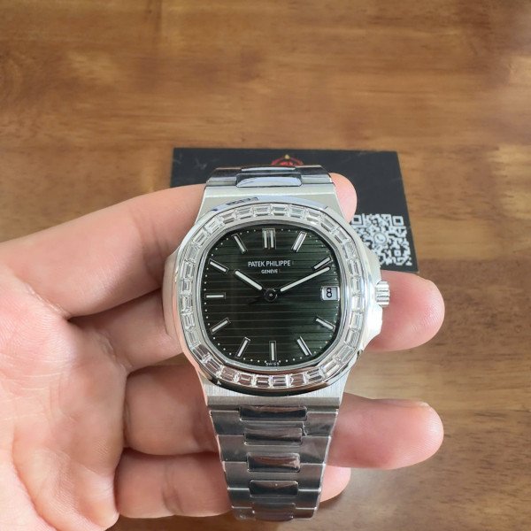 Patek Philippe Nautilus 5711/1300A-001 Green Dial Custom CVD Baguette Diamonds 40mm