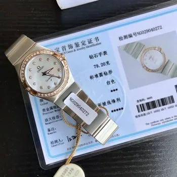 How much does the real Omega cost, Omega Discus Gray Disc Belt Color Match