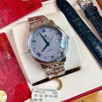 Omega watch check authenticity query, Omega 5 years free battery replacement?