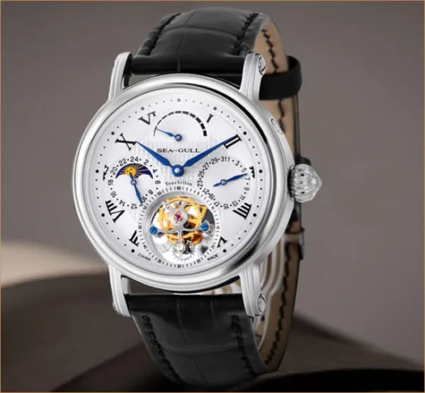Why is a tourbillon watch so expensive and what are its disadvantages