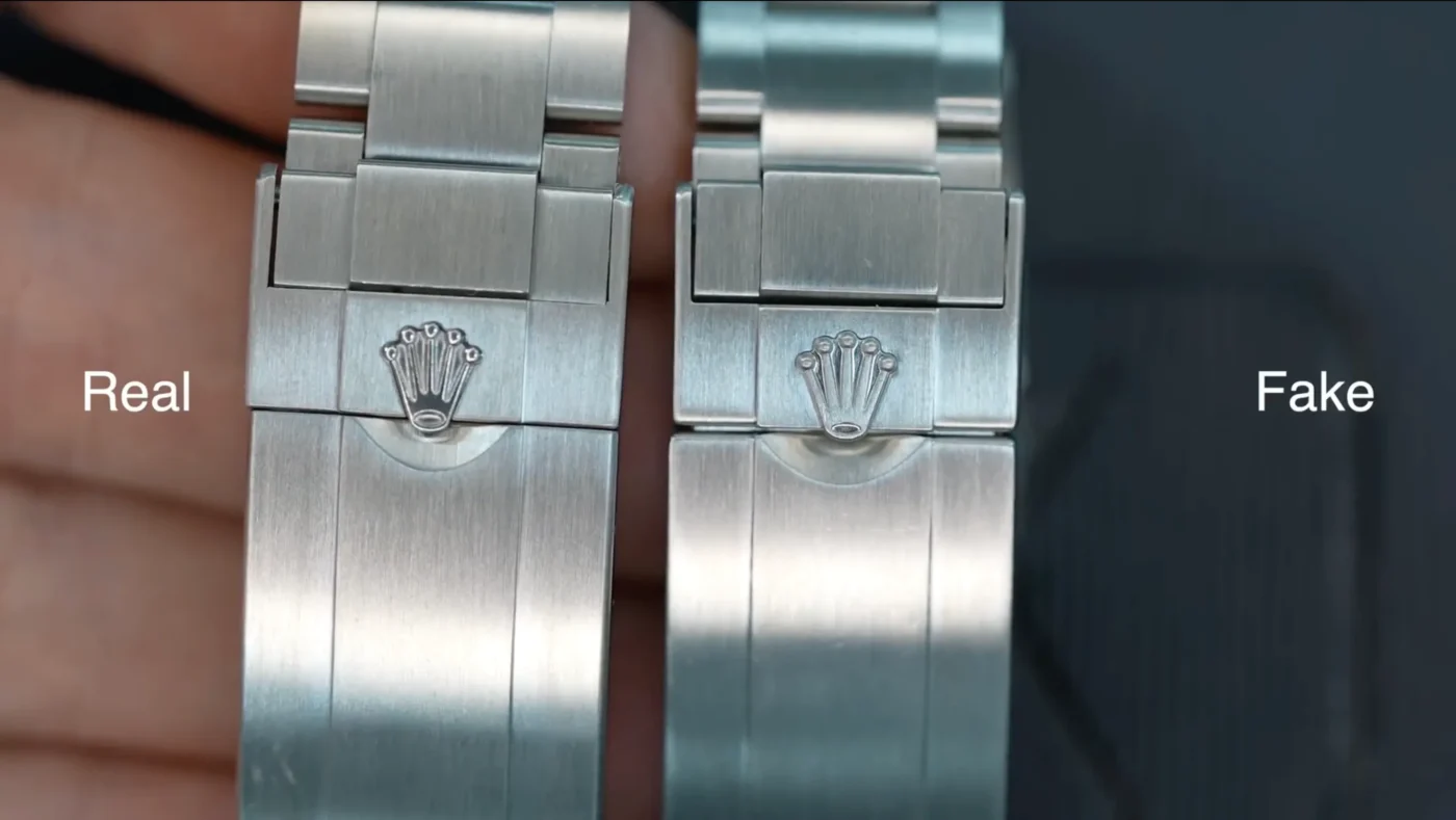 Close-up comparison of Submariner clasp crown engraving: genuine original (left) vs super clone (right) highlighting sharpness and depth differences