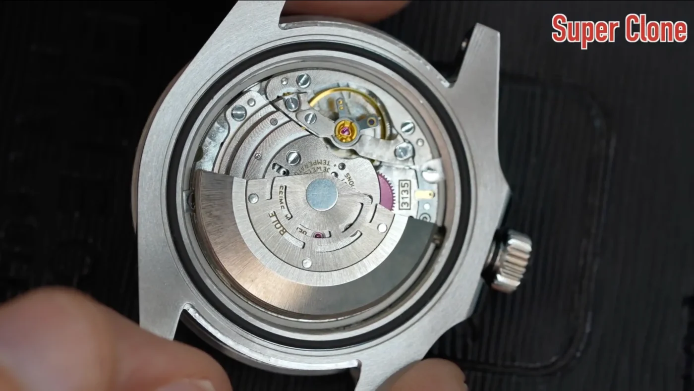 Close-up of Submariner super clone automatic movement showing cloned 3135 caliber with rotor engraving GENEVA SWISS and red reverse wheels