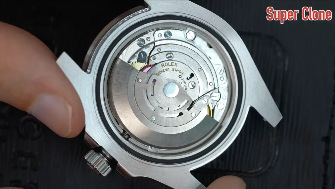 Detailed view of Submariner super clone movement interior highlighting cloned rotor, balance wheel, and 3135 caliber engraving